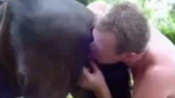 Licked the horses pussy the man fucked her